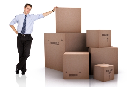 business man with packed cardboard boxes over a white background